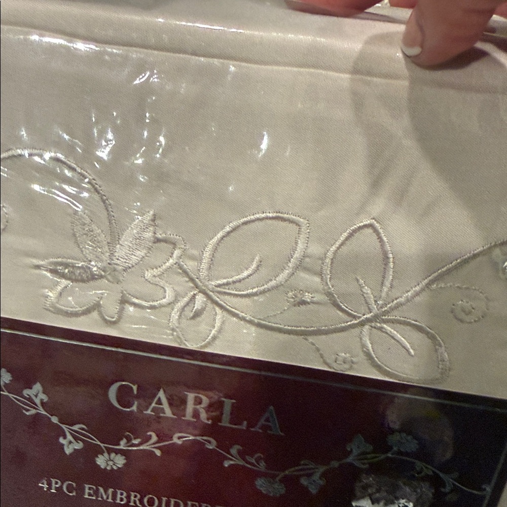 New king 4 pc embroidered sheets. Tan in color  Carla brand.